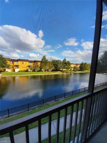 Water view featuring a fenced backyard