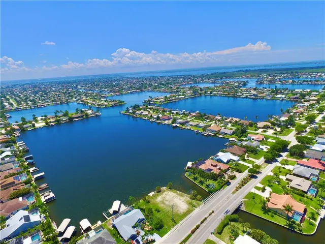 Aerial view of residential area with a large body of water
