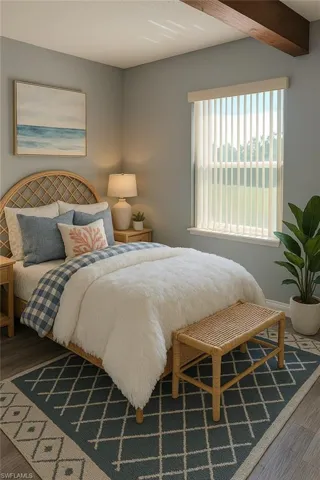 Bedroom featuring wood finished floors