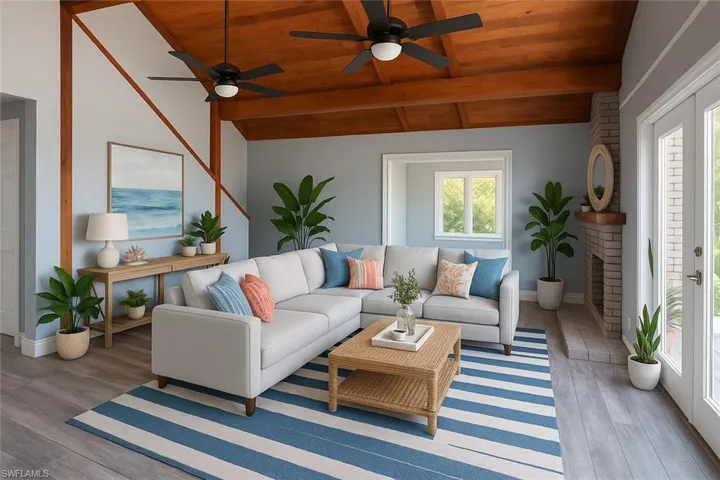 Living area with wood ceiling, wood finished floors, ceiling fan, and a brick fireplace