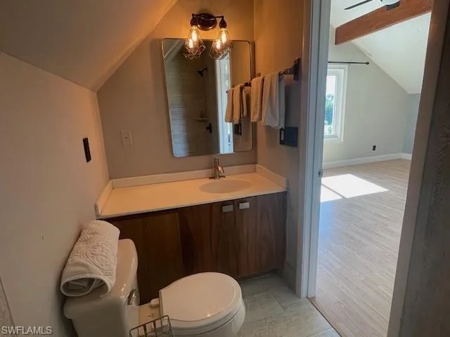 Bathroom with vanity and a shower