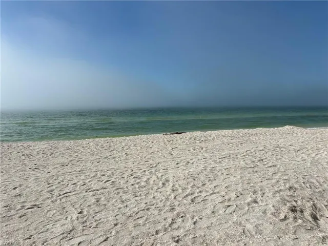 Property view of water featuring a view of the beach