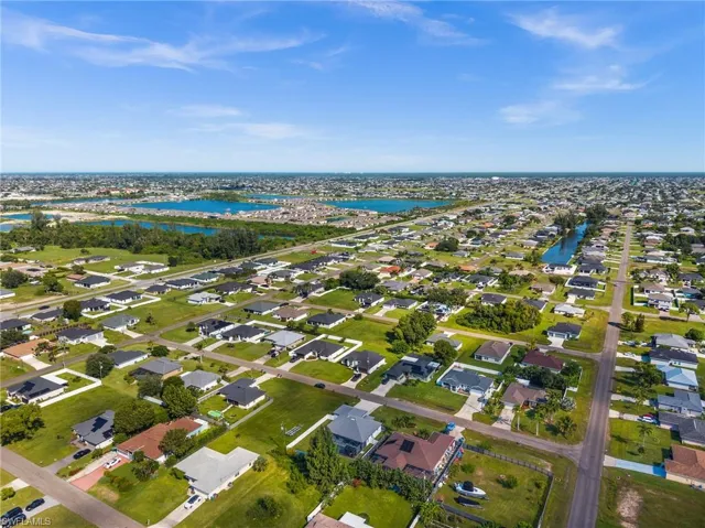 Aerial view of residential area with a nearby body of water