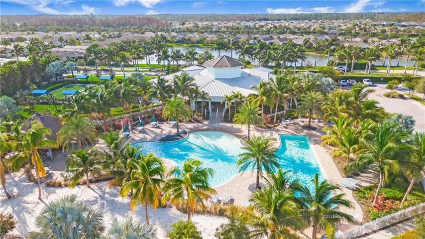 View of swimming pool featuring a water view and a patio