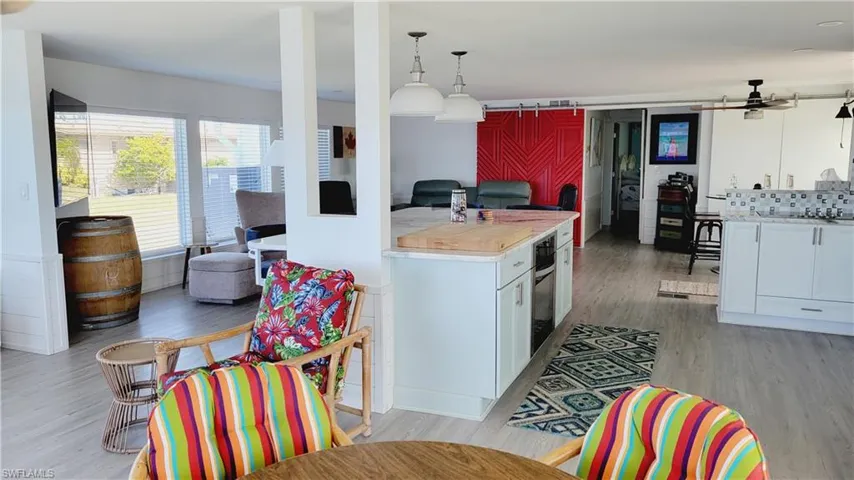 View looking from river area into open concept kitchen and living area.