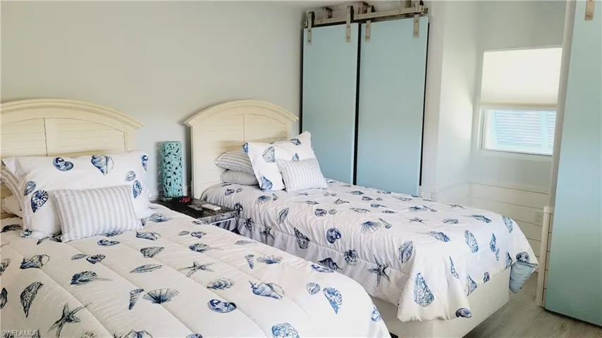2nd bedroom featuring 2 twin beds with plenty of space and 2 closets.