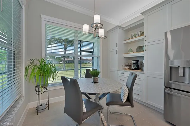 breakfast room featuring coffee bar & custom cornices