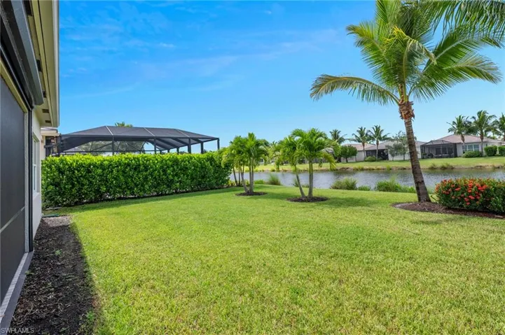 Your Lake view deep property with specimen Palms
