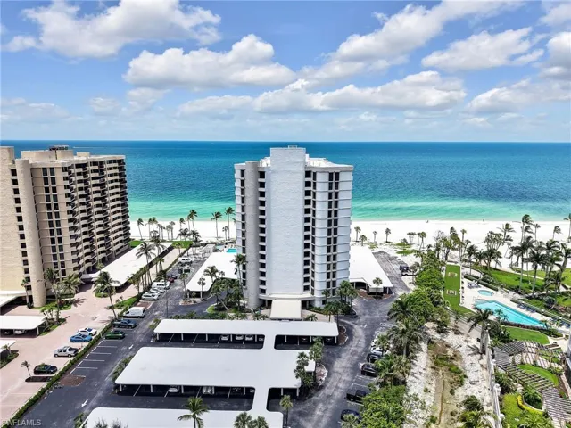 Bird's eye view of waterfront with a beach