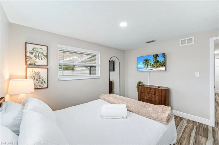 Bedroom featuring hardwood / wood-style floors