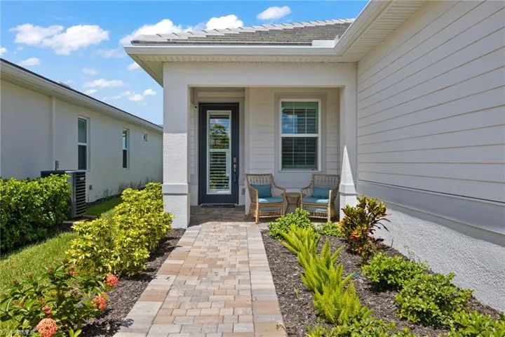 Property entrance with central AC unit