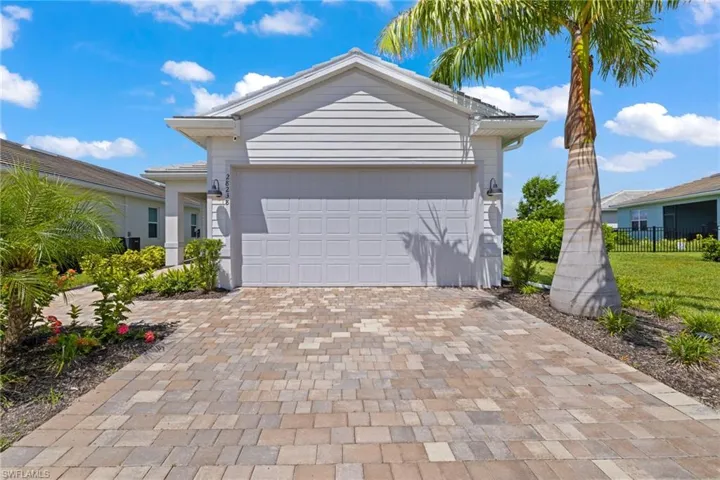 Ranch-style house featuring a garage