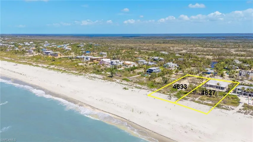 Aerial view with a view of the beach and a water view