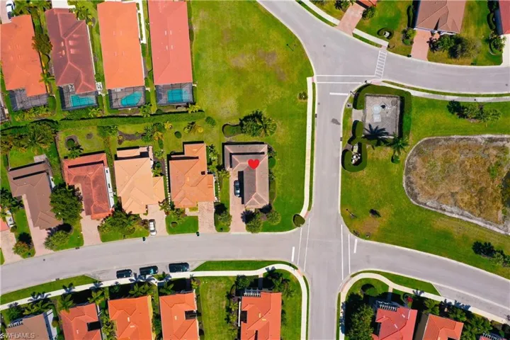 Aerial overview of property's location with nearby suburban area