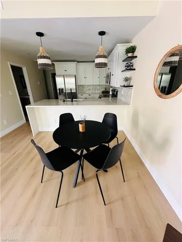 Dining room with light wood finished floors