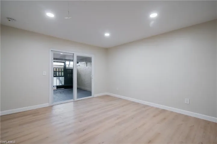 Unfurnished room featuring light wood-style flooring and recessed lighting
