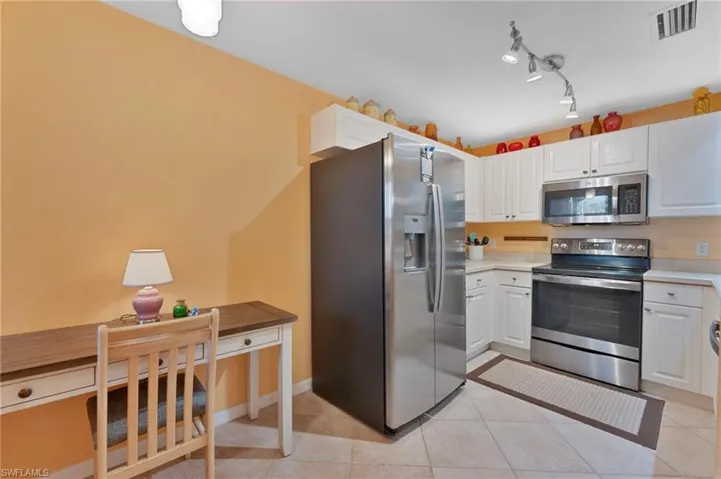 Ample Kitchen with Stainless Appliances, Pantry, Flexible Breakfast or Office Nook