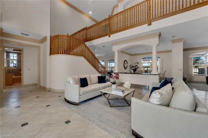 PREVIOUSLY STAGED VIEW: Formal living room off of main entrance
