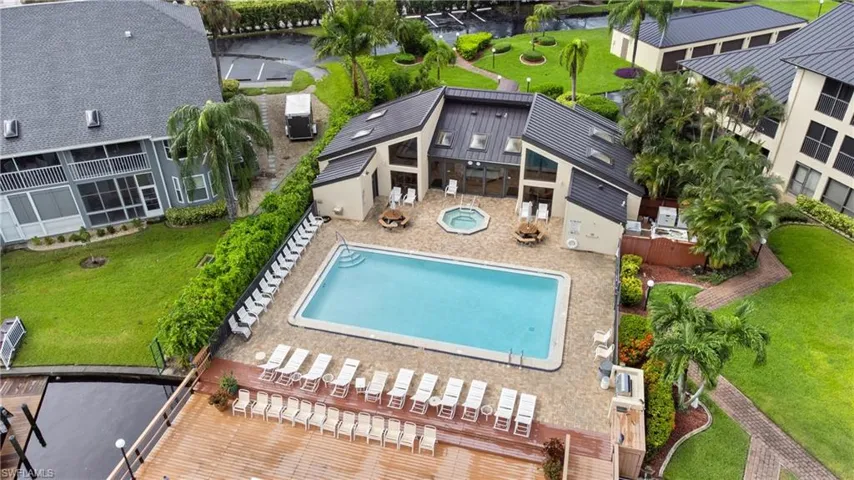 View of swimming pool with a lawn and a patio area