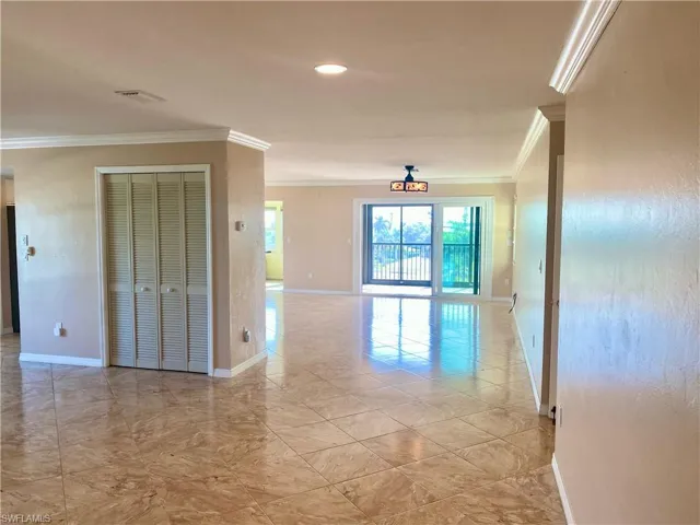 Entry hall featuring crown molding