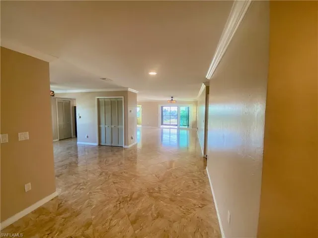 Entry hall featuring crown molding