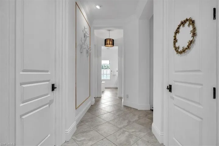 Walk in closets between the bedroom and bath