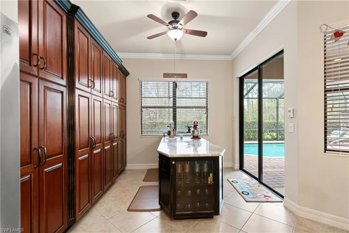 These cabinets have been painted blue to match the kitchen.