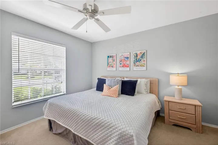 Bedroom featuring carpet floors and ceiling fan