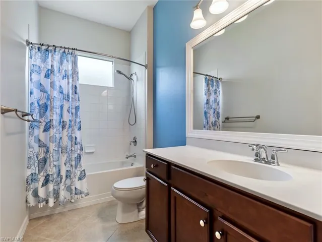 The Guest Bath has a tiled tub/shower combination, spacious vanity, and linen closet.