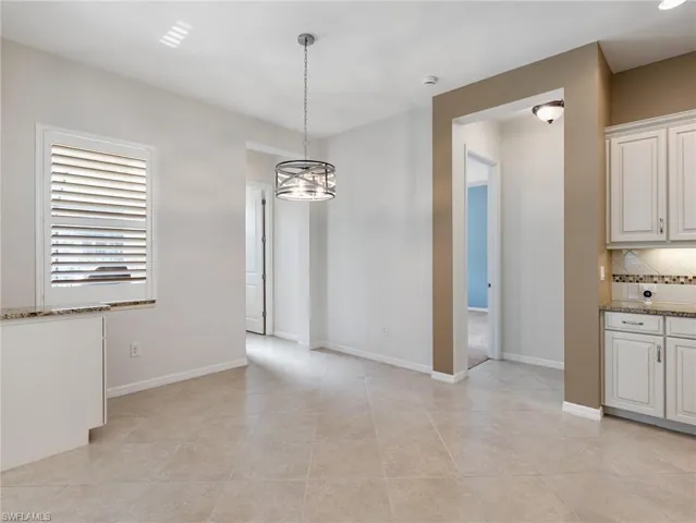 The Dining area is just off of the Kitchen in this Open Concept space