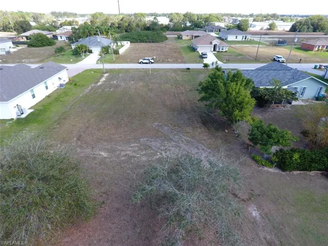 View looking east which shows more homes inviting you into the neighborhood.