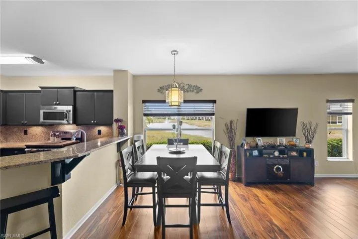 Dining space featuring dark hardwood / wood-style floors