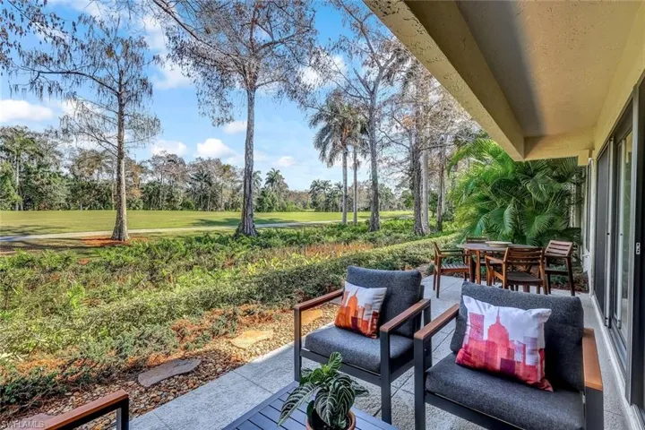View of patio with outdoor seating - great space to enjoy the sun or cocktails at sunset