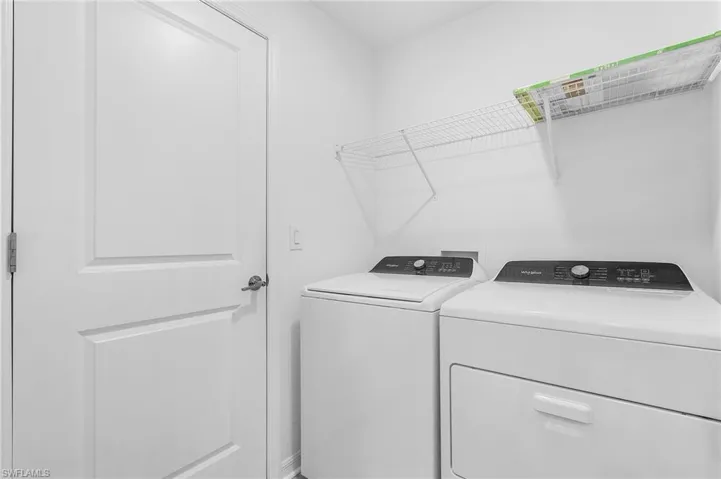 Clothes washing area with washer and dryer