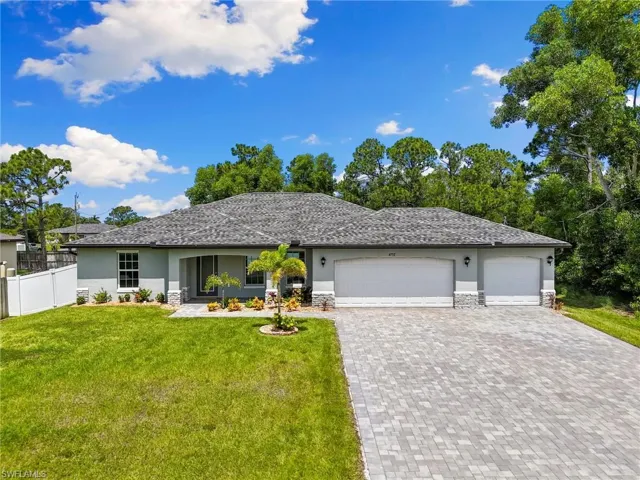 A large 3-car garage and extended block paver driveway welcomes you and guests to the home!