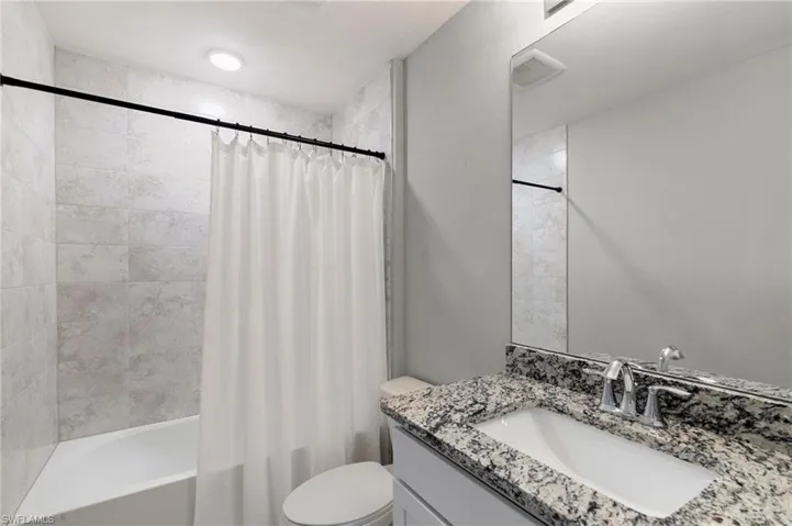 Guest Bath with Tub Shower Combo & Porcelain Tile to Ceiling for High End Finish!