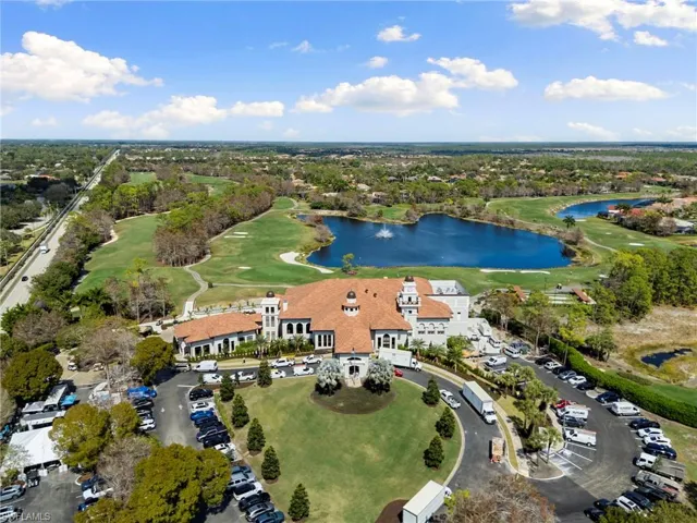 Bird's eye view of a local golf course and a nearby body of water