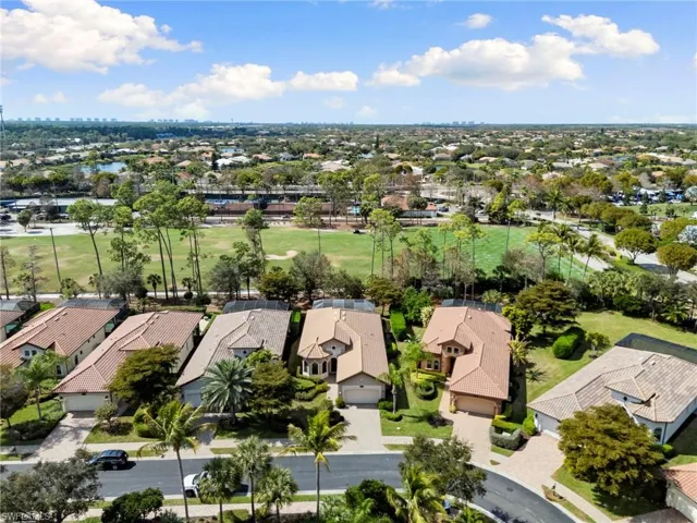 Aerial perspective of suburban area with a golf club