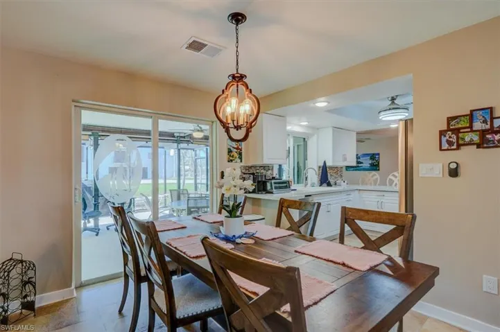 Dining room featuring sink and ceiling fan