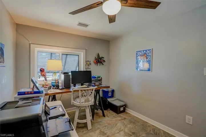 Home office with ceiling fan