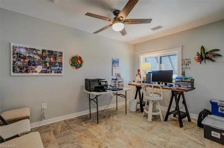 Office space featuring ceiling fan