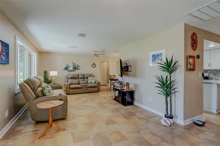 Living room featuring ceiling fan
