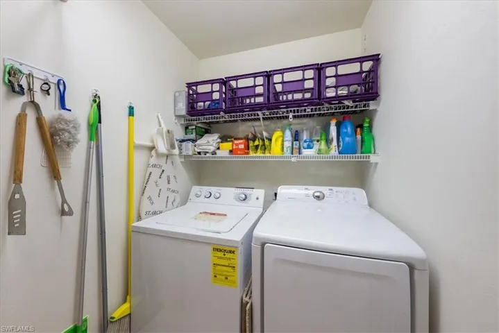 Washroom with laundry area and separate washer and dryer