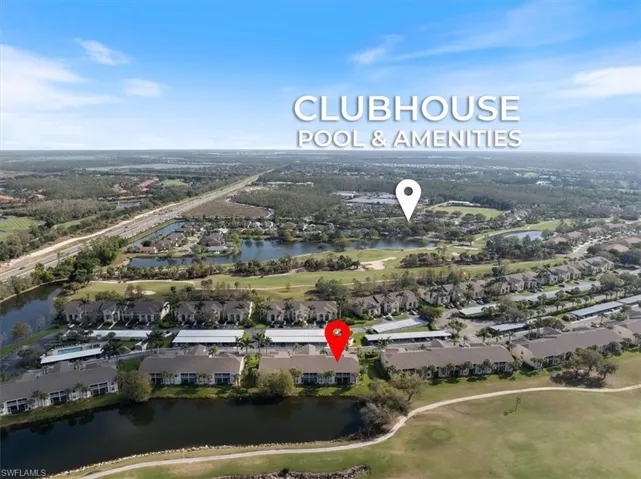 Drone / aerial view featuring a residential view, view of golf course, and a water view