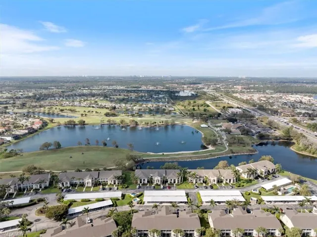Bird's eye view featuring a water view and a residential view