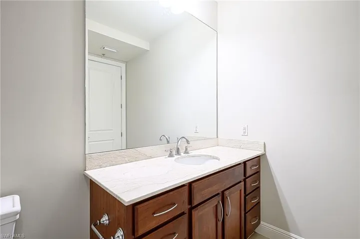 Bathroom featuring toilet and vanity