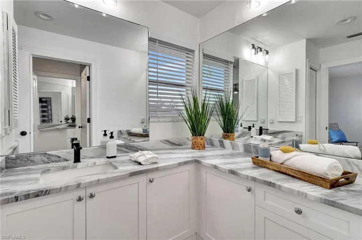 Expanded Jack and Jill with seperate rooms for 2 vanities