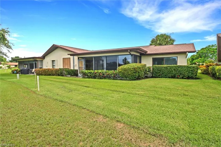 Single story home featuring a front yard