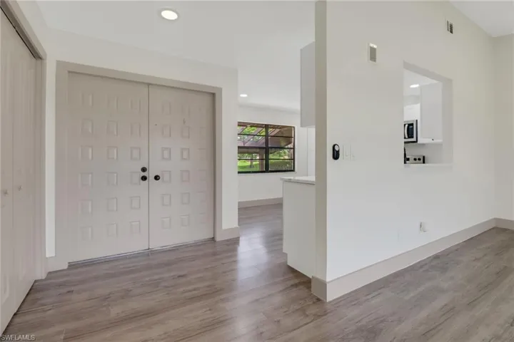 Foyer featuring light wood-type flooring