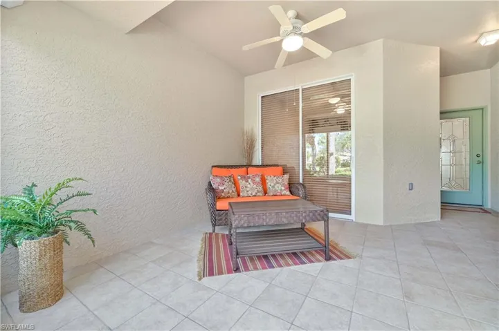 View of patio featuring ceiling fan